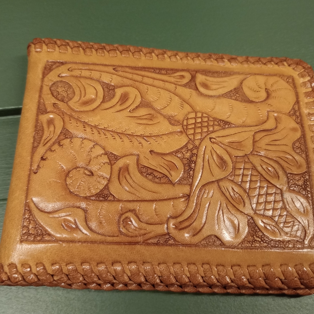 Genuine hand tooled leather bi-fold wallet